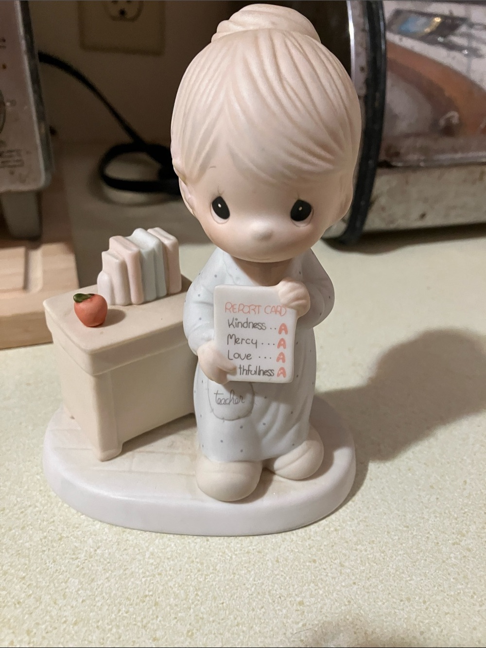 Precious Moments Teacher Figurine in Cream, White and Red Apple Accent
